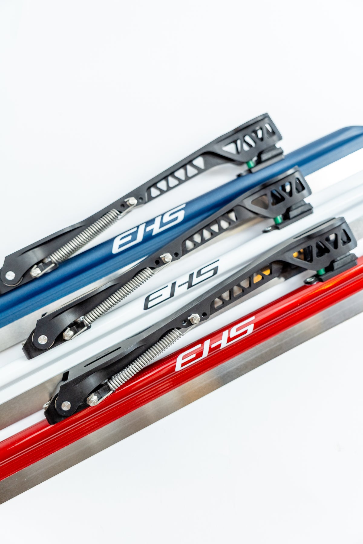 Alba long track clap blades in blue, white and red tubes, stacked three-quarter