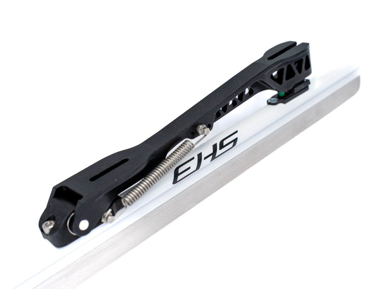 Alba long track clap blade, three-quarter view toward the toe of the runner