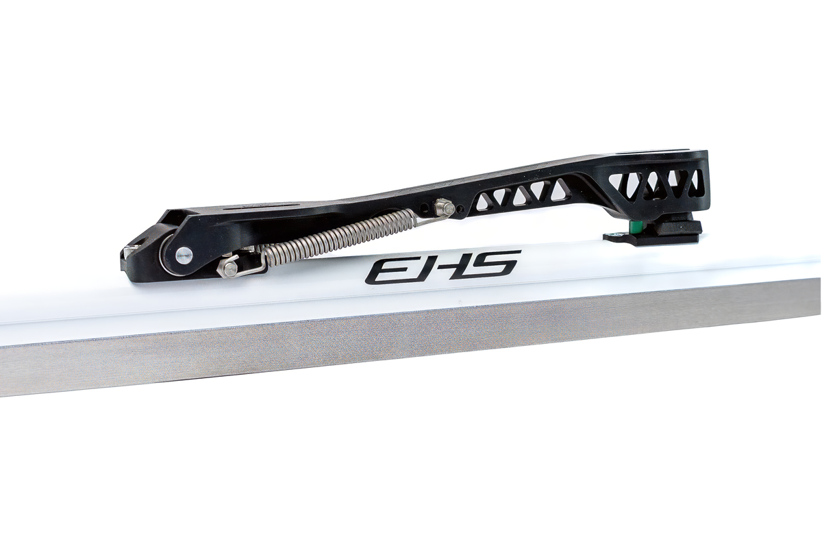 EHS StayBent Alba long track speed skate clap blade, close-up of the clap hinge, spring and white EHS tube