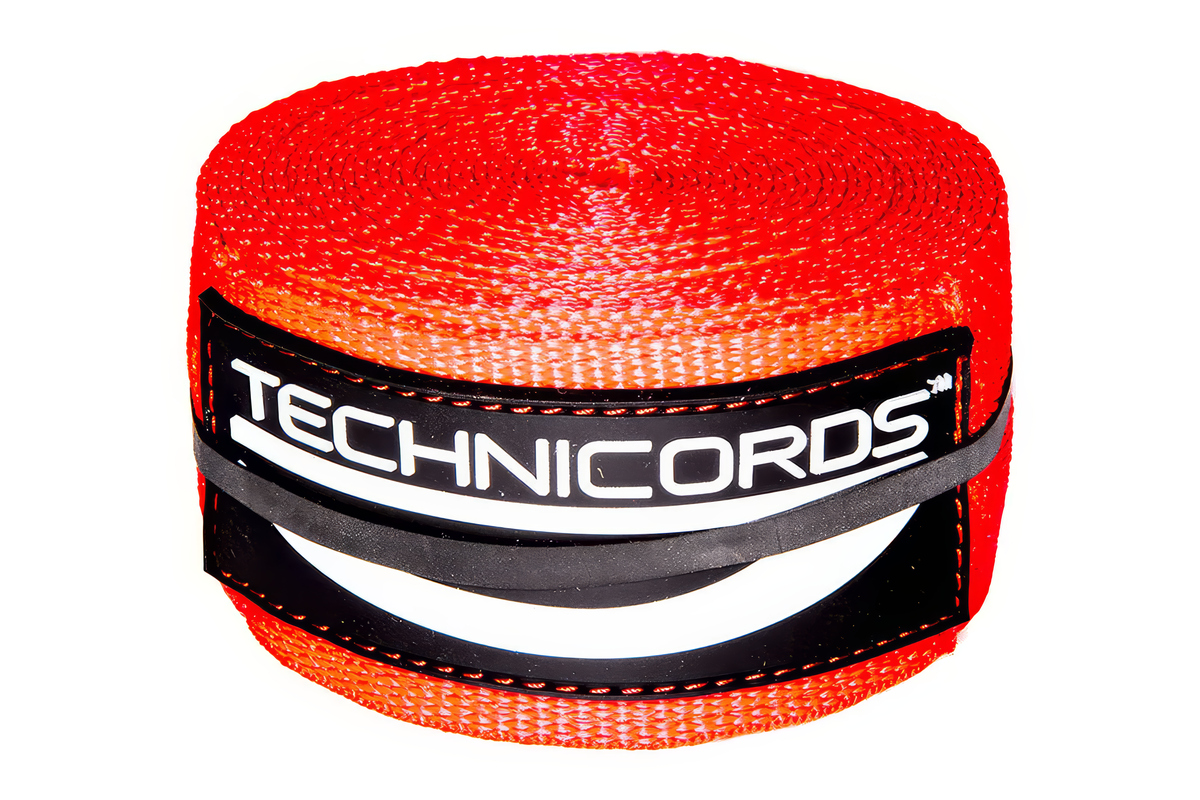 Ceinture de virage StayBent TechniCords, rouge, roulée avec l'étiquette TechniCords